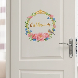 Floral bathroom door decal with golden wreath, pink flowers, and colorful birds decor