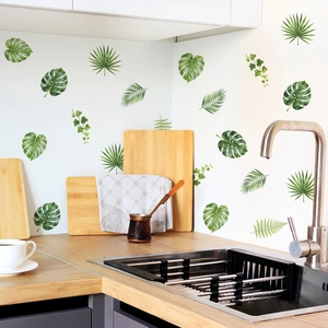 Tropical monstera and palm leaf wall stickers for a natural kitchen interior decoration