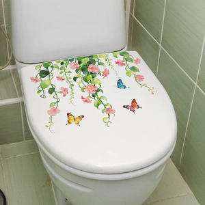 Floral toilet seat decal featuring pink watercolor flowers, green vines, and butterflies
