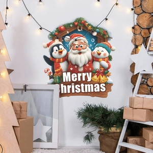 Christmas wall decal with Santa Claus and penguin on white wall with festive decorations