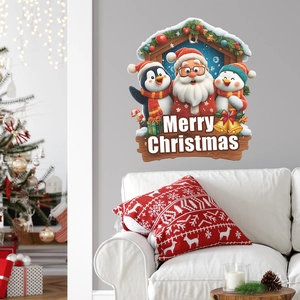Christmas wall stickers with Santa, penguin and snowman over a sofa in a cozy living room