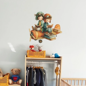 Wall decal of kids reading on a book plane for children's bedroom decor