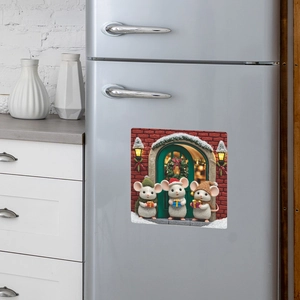 Three Christmas mice magnet sticker on a grey refrigerator door for home decoration