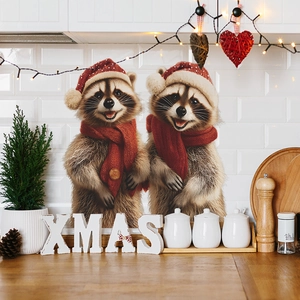 Christmas wall stickers featuring two raccoons with red hats and scarves on kitchen tile
