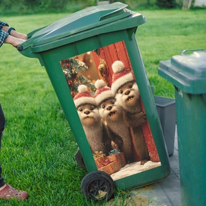Outdoor Christmas beaver stickers on a green wheelie bin with holiday gift boxes