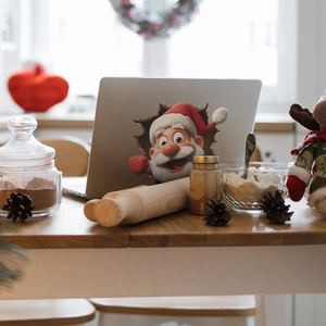 3D Santa Claus laptop skin sticker with a creative breaking wall visual effect