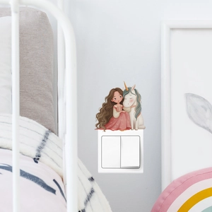 Cute girl hugging unicorn wall sticker for light switch decoration in a cozy bedroom