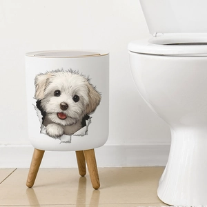 Minimalist white trash can with 3D puppy pattern and wooden legs for bathroom decor