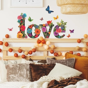Floral LOVE letters wall decal with butterflies for romantic bedroom interior decor
