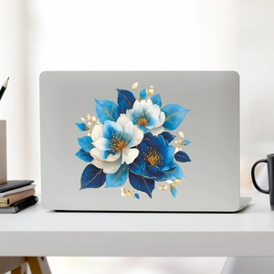Blue and white floral laptop decal with gold outlines on a silver notebook cover