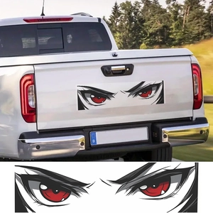 Anime car decal featuring red aggressive eyes on a pickup truck and white background