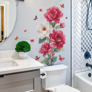 Floral wall decals with red and white flowers and colorful butterflies in a modern bathroom