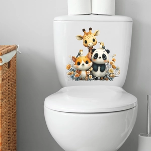 Cute cartoon giraffe and panda toilet lid stickers with floral patterns on a white tank