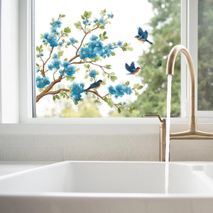 Blue flower branches and birds wall stickers for home decor on a bright window scene