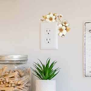 Elegant 3D floral light switch sticker with white flowers and golden leaves for home decor