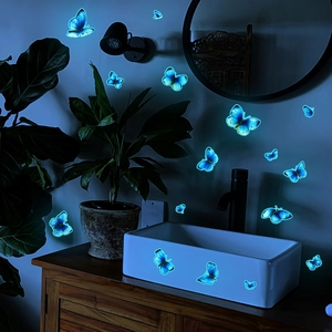 Luminous blue butterfly wall decals with glowing effect for home and bathroom decor