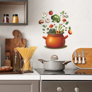 Kitchen wall decal featuring an orange cooking pot and flying colorful fresh vegetables