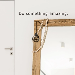 Rustic wood frame mirror with wooden beads and hanging metal birdcage lamp decoration