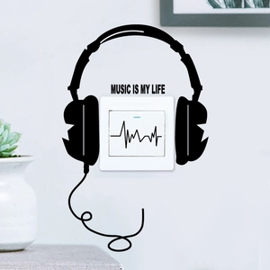 Detail of MUSIC IS MY LIFE headphone wall sticker with heartbeat line around light switch