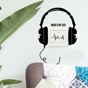 Detail of Music Is My Life light switch wall decal with headphones and heartbeat line