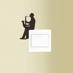Black saxophone player silhouette wall sticker decorating a light switch panel