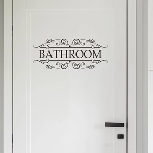 Elegant black Bathroom wall sticker with vintage scroll design on white door