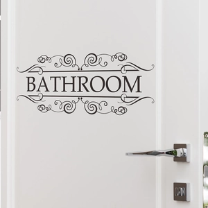 Minimalist black bathroom door sticker with elegant scroll pattern on white surface