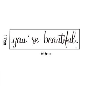 Detail view of you're beautiful cursive vinyl wall decal measuring 60cm by 17cm