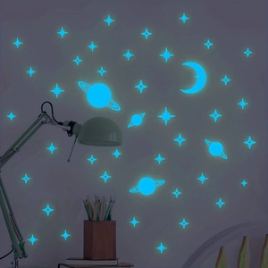 Luminous blue glow wall stickers with moon and star shapes for children's bedroom decor