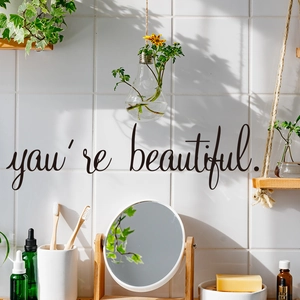 Minimalist 'you're beautiful' vinyl bathroom mirror decal with elegant cursive handwriting