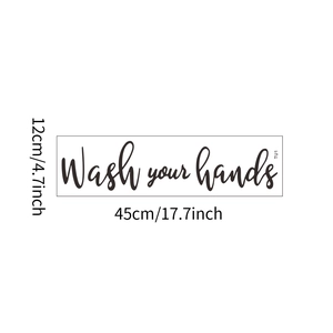Dettaglio dell'adesivo da parete Wash Your Hands con dimensioni 45x12cm e testo nero