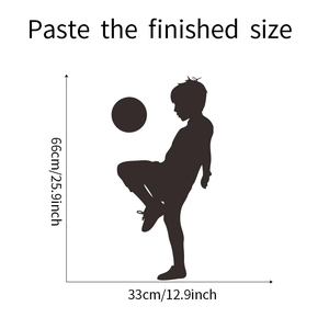 Detail view of soccer boy wall sticker showing finished dimensions of 66cm by 33cm