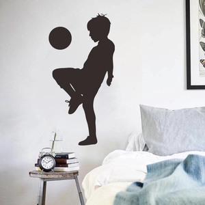 Minimalist silhouette wall sticker of a boy playing soccer for kids bedroom decor