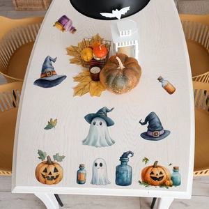 Watercolor Halloween wall stickers featuring pumpkins, ghosts and witch hats on wood table
