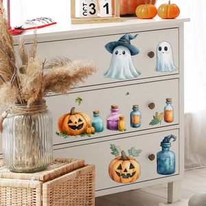Cute Halloween wall decals set featuring ghosts with witch hats and pumpkins on a white cabinet