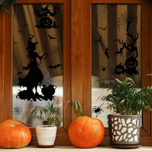 Halloween window stickers featuring witch, pumpkin and bats silhouette on glass
