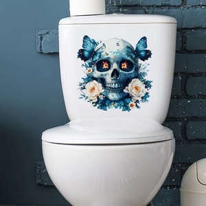 Floral blue skull toilet sticker with butterflies and flowers on a white ceramic tank