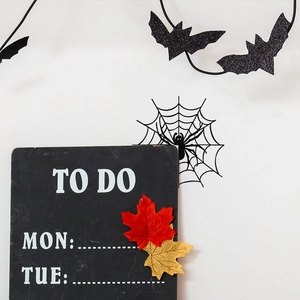 Halloween home decor set featuring glittery black bats and spider web wall stickers