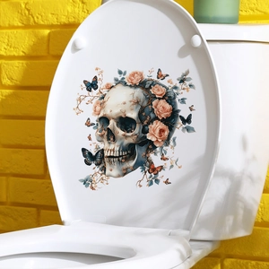 Detail of floral skull toilet sticker with pink roses and colorful butterflies