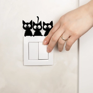 Three cute black cat wall stickers for light switch decoration with big eyes