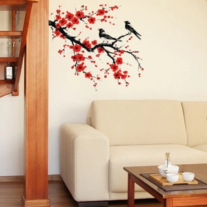 Sticker mural fleurs de prunier rouges et oiseaux pour déco salon élégante