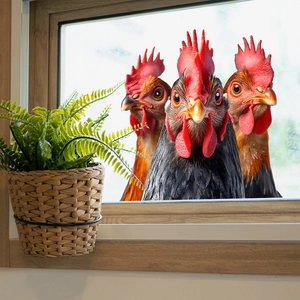 Three realistic colorful rooster head wall stickers on window with a green potted plant