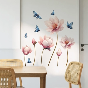 Pink floral wall stickers with blue butterflies in a modern Nordic dining room setting