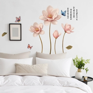 Bedroom wall sticker detail with pink magnolia flowers and elegant butterfly decorations