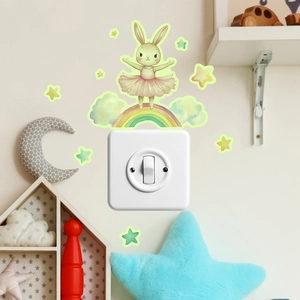 Glow-in-the-dark rabbit sleeping on rainbow switch sticker with stars for wall decor