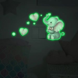 Luminous cartoon elephant and heart wall switch stickers glowing in dark room