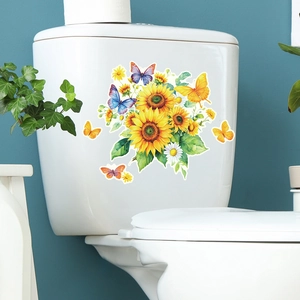Adesivi luminosi con girasoli e farfalle applicati allo sciacquone del bagno blu