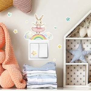 Glow-in-the-dark ballet bunny wall decal sticker next to light switch in kid room