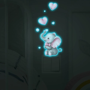 Luminous wall sticker featuring a cute cartoon elephant and pink hearts for light switches