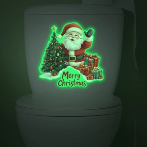 Close-up of luminous Santa Claus and Christmas tree toilet sticker with glowing effect